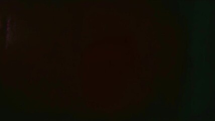 Wall Mural - A dark red gradient background with glowing particles that move gently, creating a dynamic yet calming effect, 4k Animation Video