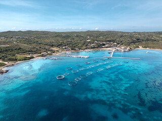 Sticker - Aerial view of yachts moored in the harbour of the village of Gurgazu on the south east coast of the Mediterranean island of Corsica