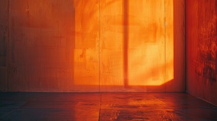 Wall Mural - Wall in a room illuminated by the orange light of the sunset Abstract backdrop