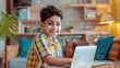 © Neha - indian schoolboy studying on laptop
