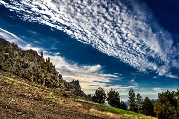 Wall Mural - Clouds over the slate rocks of Head Cliff