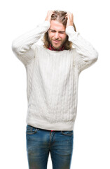 Sticker - Young handsome man with long hair wearing winter sweater over isolated background suffering from headache desperate and stressed because pain and migraine. Hands on head.