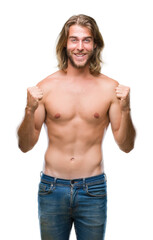 Sticker - Young handsome shirtless man with long hair showing sexy body over isolated background celebrating surprised and amazed for success with arms raised and open eyes. Winner concept.