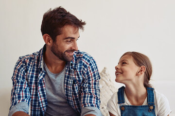 Home, relax and dad with smile at girl for support, childhood and bonding together on weekend. Happy family, man and daughter with care in bedroom for gratitude, appreciation and love in fatherhood