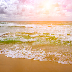 Wall Mural - bright sunrise over ocean waves.