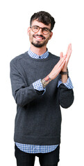 Wall Mural - Young handsome smart man wearing glasses over isolated background Clapping and applauding happy and joyful, smiling proud hands together