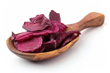 Wall Mural - Dehydrated beet slices on spoon against white backdrop