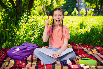 Sticker - Full length photo of adorable funny little girl have fun outside picnic do homework activity enjoy summer weekend pastime fresh air outdoor