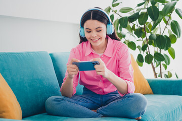 Poster - Photo of positive good mood woman dressed pink shirt headphones enjoying watching video gadget indoors house apartment room