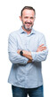 © Krakenimages.com - Middle age hoary senior business man over isolated background happy face smiling with crossed arms looking at the camera. Positive person.