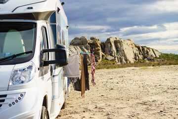 Canvas Print - Washing laundry hanging to dry outdoors at caravan