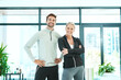 © Penn/peopleimages.com - Portrait, fitness and couple in wellness center, exercise and teamwork for motivation. Face, people and man with woman, workout or challenge with support, training or trainer with confidence or pride