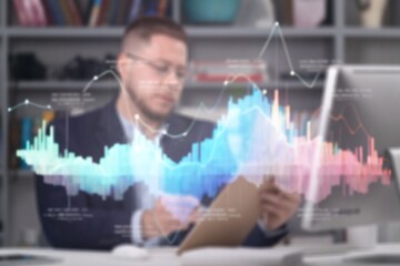 Wall Mural - Image of business graphs and businessman at work