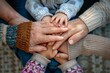 © InfiniteStudio - Hands of four generations together