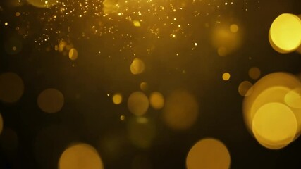 Leinwandbilder - Abstract bokeh of golden lights against a dark background.