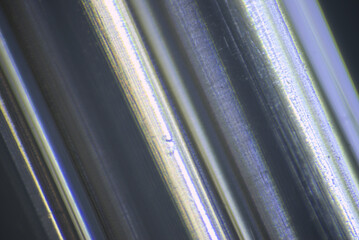 macro photography background plastic tubes with diffracted light