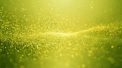 Leinwandbilder - A green and gold background with sparkling glitter.