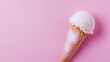 © Luluraschi - Sugar-coated ice cream cone on pink background, ultra processed dessert