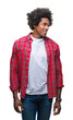© Krakenimages.com - Afro american man over isolated background looking away to side with smile on face, natural expression. Laughing confident.