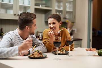 smile, couple and eating food in home with wine on date night for romance in relationship with bondi