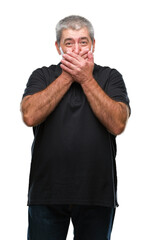 Wall Mural - Handsome senior man over isolated background shocked covering mouth with hands for mistake. Secret concept.