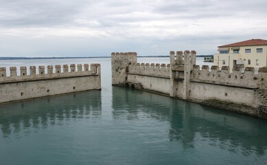 Wall Mural - Scaliger castle in the historical center of Sirmione town near Garda lake in Italy.