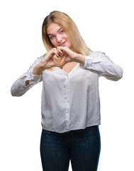 Poster - Young caucasian woman over isolated background smiling in love showing heart symbol and shape with hands. Romantic concept.