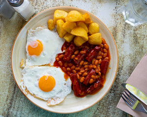 Sticker - English breakfast - scrambled eggs with sausage, beans and boiled potatoes in tomato sauce