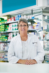 Poster - Woman, mature and pharmacist portrait in pharmacy, trust and drug store or medication dispensary. Healthcare, worker and medicine retailer for career, medical consultant and professional for wellness