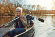 © ReeseArcurs/peopleimages.com - Lake, rowing and kayak with old couple, nature and retirement with happiness, relax and vacation. Outdoor, river and mature man with senior woman, freedom and trust with holiday and weekend break