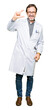 © Krakenimages.com - Middle age doctor men wearing medical coat smiling and confident gesturing with hand doing size sign with fingers while looking and the camera. Measure concept.