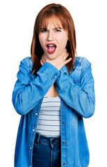 Sticker - Redhead young woman wearing casual denim jacket shouting and suffocate because painful strangle. health problem. asphyxiate and suicide concept.