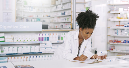 Wall Mural - Woman, pharmacist and reading with medication on prescription, side effects or symptoms at pharmacy. Young African or medical employee checking pharmaceutical box or product at dispensary store