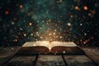 © Anna - open antique book on wooden table with magic lights, glitter blurred overlay