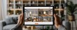 © chayantorn - Digital tablet displaying a property listing with floor plans, property sales tech, modern real estate tools