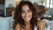 © kvladimirv - Smiling Woman with Curly Hair Relaxing at Home