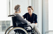 © ReeseArcurs/peopleimages.com - Senior woman, wheelchair and nurse with support for healthcare, empathy or trust in elderly care or retirement at home. People, caregiver and touching person with a disability for help at house