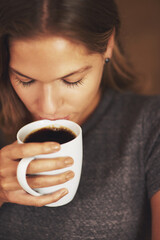 Poster - Woman, coffee and drinking in house or apartment for relax, calm or peace on weekend. Female person, hot drink and beverage in home for break, brunch or lunch with eyes closed, satisfied or self care