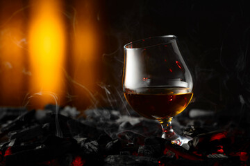 Poster - Snifter of brandy on a burning charcoal.