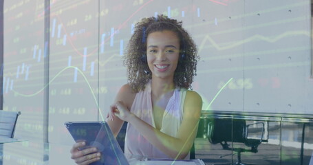 Poster - Image of stock market data processing against biracial woman talking on image call at office