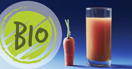 Wall Mural - Image of bio text on green circle over carrot and glass of carrot juice on blue background