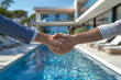 © Ekaterina Shvaygert - Buyer and seller waring a suit shake hands after selling a villa with a pool by the sea, successful agreement