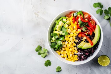 Poster - Top view of salad in white bowl with copy space containing avocado beans corn and bell pepper