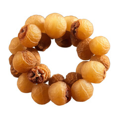 Wall Mural - Dried longan berries light brown with a smooth surface swirling elegantly in a mesmerizing spiral