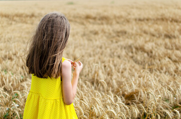 Girl in a wheat field