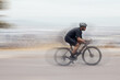 © peopleimages.com - Man, fitness and speed with cyclist on mountain bike in workout, exercise or outdoor cardio. Active male person, athlete with motion blur on bicycle for fast cycling or extreme adrenaline on road