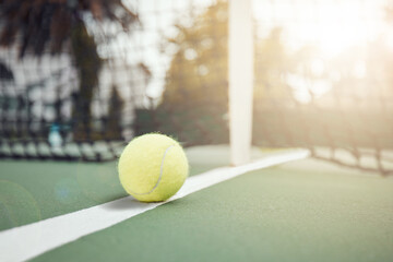 Poster - Tennis, practice and court with ball by net for sports match, tournament and outdoors at sunset. Green, sphere and stadium with equipment on ground for game, activity and competition in Paris