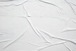 © Kwangmoozaa - white crumpled and creased glued wrinkled paper poster texture background
