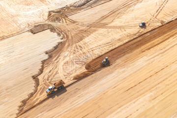 Wall Mural - Aerial view of construction site with bulldozers