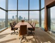 © Stefan - Moderner Konferenzraum mit Ledersessel, Holztisch und Blick auf die urbane Stadtlandschaft durch große Fenster. Professioneller Arbeitsplatz.